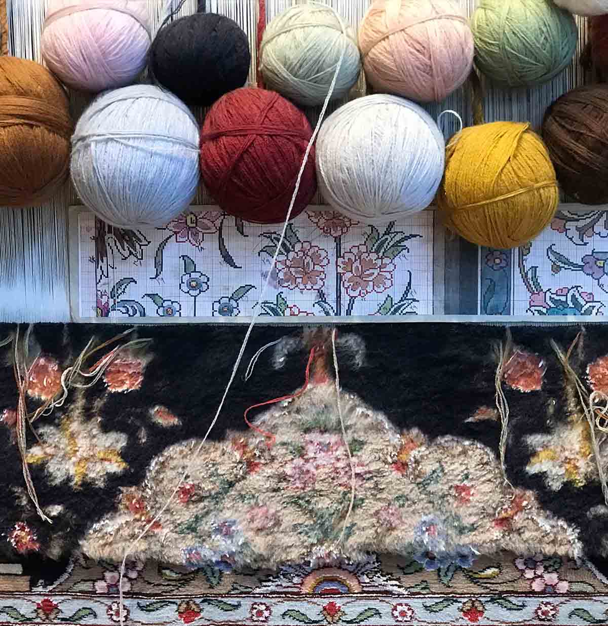 Handmade rug compared with a machine-made rug